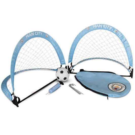 Manchester City-themed soccer goal set with ball and pump on a white background