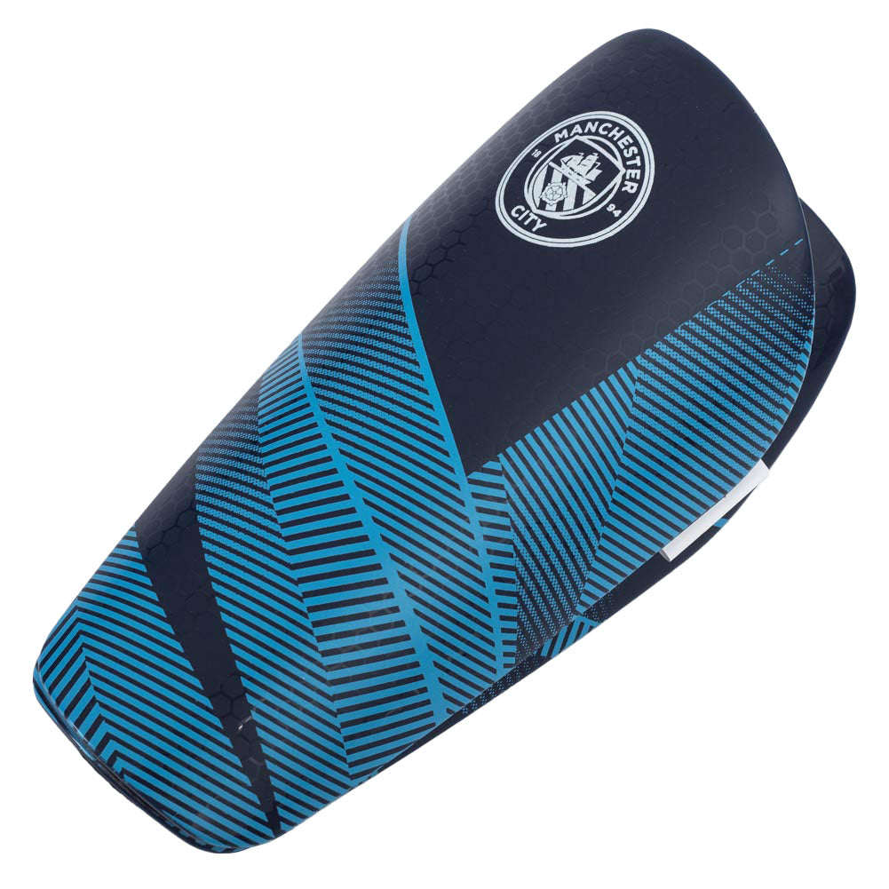Blue shin guard with Manchester City logo