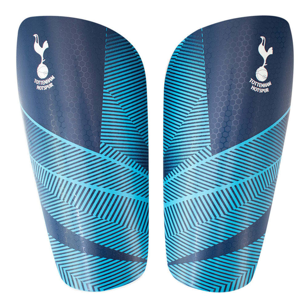 Blue and navy shin guards with Tottenham Hotspur logo on a white background